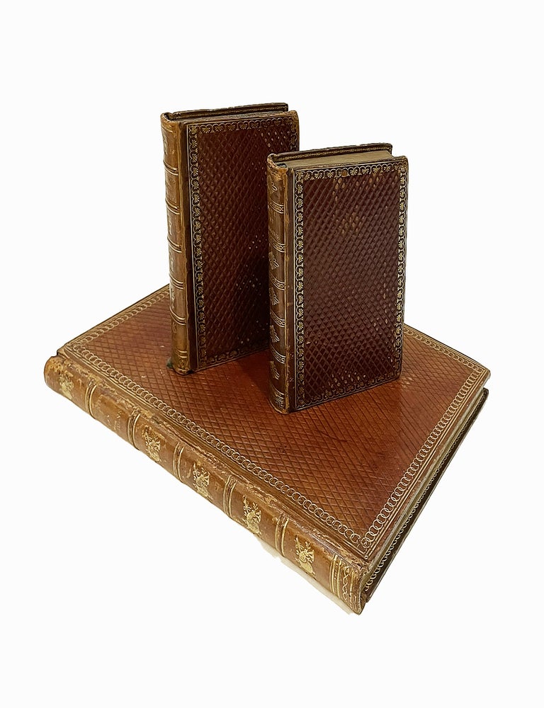 Item #5212 Bel ensemble de trois reliures &agrave; d&eacute;cor gaufr&eacute; similaire, l'une ex&eacute;cut&eacute;e par Boz&eacute;rian, les deux autres par Thouvenin. RELIURES, BOZ&Eacute;RIAN, THOUVENIN.
